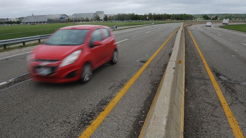 Harshman Road from Springfield Street to Airway Road near Wright-Patterson Air Force Base and the National Museum of the U.S. Air Force will be reduced to one lane in each direction starting next week in order to repair the barrier wall. MARSHALL GORBY/STAFF
