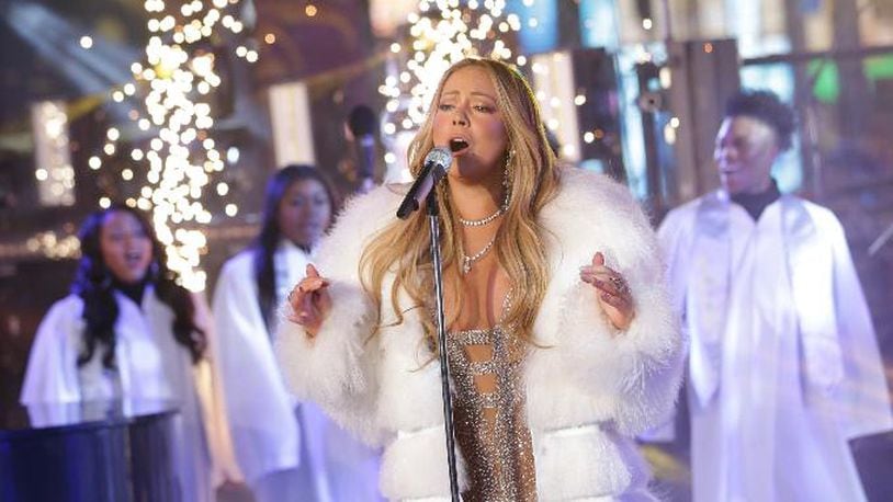 Mariah Carey performs on stage at the New Year's Eve celebration in Times Square on Sunday, Dec. 31, 2017, in New York. (Photo by Brent N. Clarke/Invision/AP)