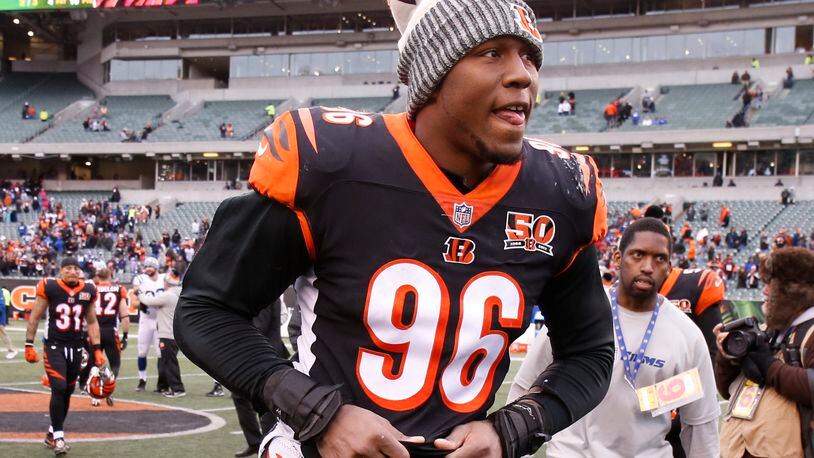 Cincinnati Bengals defensive end Carlos Dunlap runs off the field after an NFL football game against the Indianapolis Colts, Sunday, Oct. 29, 2017, in Cincinnati. The Bengals won 24-23. (AP Photo/Gary Landers)