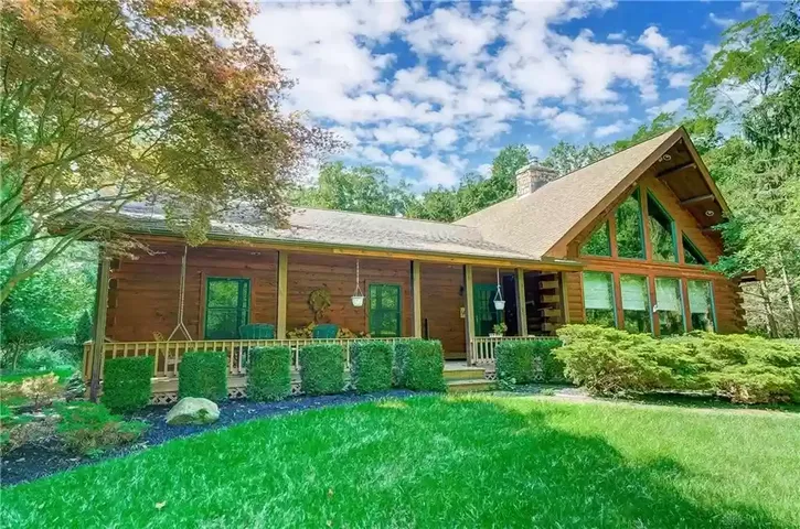 PHOTOS: Custom log-cabin style home listed near New Carlisle