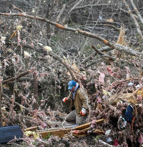 Photos: Tornadoes leave path of death, destruction in parts of Southeast