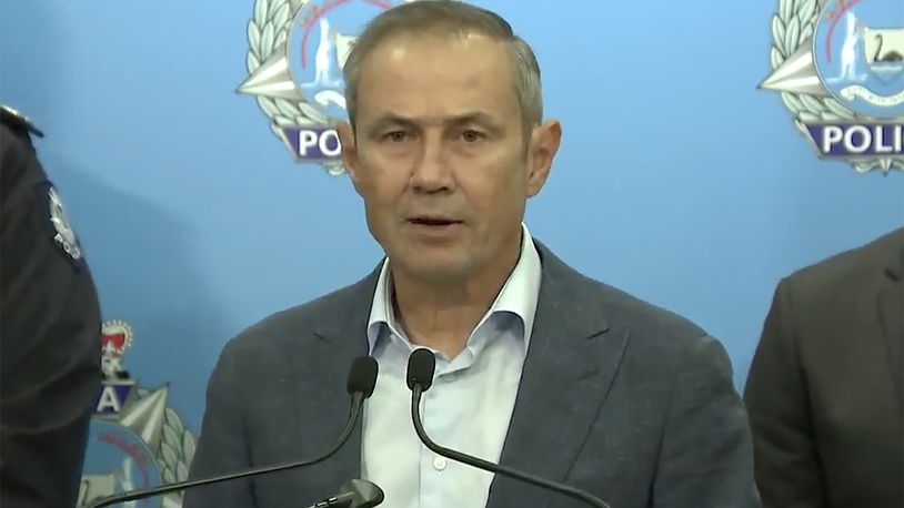 In this image from a video, Western Australian Premier Roger Cook speaks at a press conference in Perth, Australia Sunday, May 5, 2024. A 16-year-old boy armed with a knife was shot dead by police after he stabbed a man in the Australian west coast city of Perth, officials said Sunday. (Australian Broadcasting Corporation via AP)