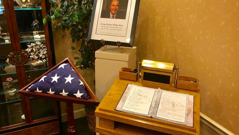 Routsong Funeral Home in Kettering is inviting guests on Tuesday to sign a registry book in honor of former President George H.W. Bush. The book will be sent to the Bush family. CONTRIBUTED