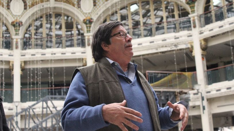 Bill Struever, with Maryland firm Cross Street Partners, discusses plans for the Dayton Arcade during a tour of the rotunda. Plans for the complex include housing, artist and creative spaces, a brewery, shops, restaurants and a boutique hotel. CORNELIUS FROLIK / STAFF
