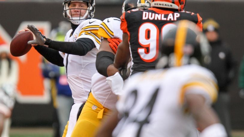 Steelers quarterback Ben Roethlisberger (7) looks to complete a pass during their game against the Bengals at Paul Brown Stadium, Sunday, Dec. 18, 2016. GREG LYNCH / STAFF