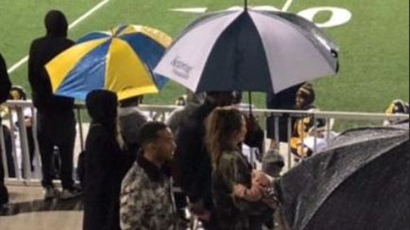 John Legend, Chrissy Teigen, and their daughter attend Springfield, Fairmont football game (iWitness7 photo)