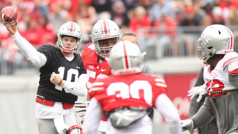 Ohio State's Joe Burrow throws a pass in the spring game on Saturday, April 14, 2018, at Ohio Stadium in Columbus.