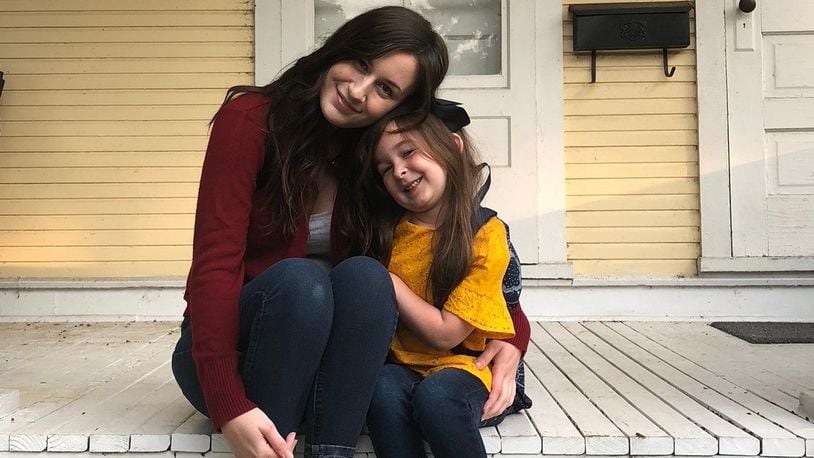 Corey Deel and her daughter, Zoe, pose for their first days of school: Deel went to Sinclair Community College and Zoe attended kindergarten. Courtesy of University of Dayton.
