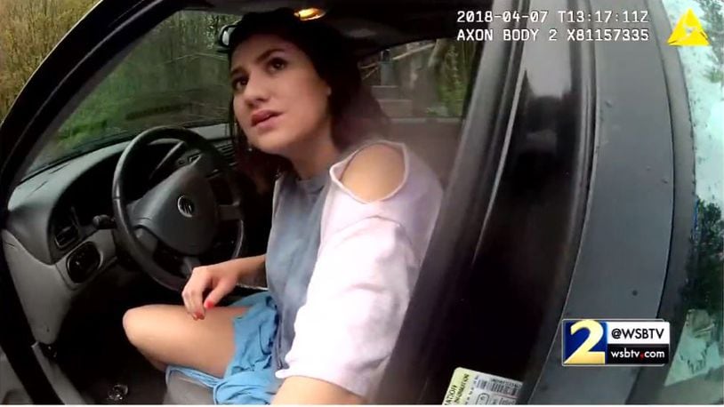 Body camera video from a traffic stop in April appears to show two Roswell, Georgia police officers using a mobile app to decide whether they should arrest a woman for speeding.