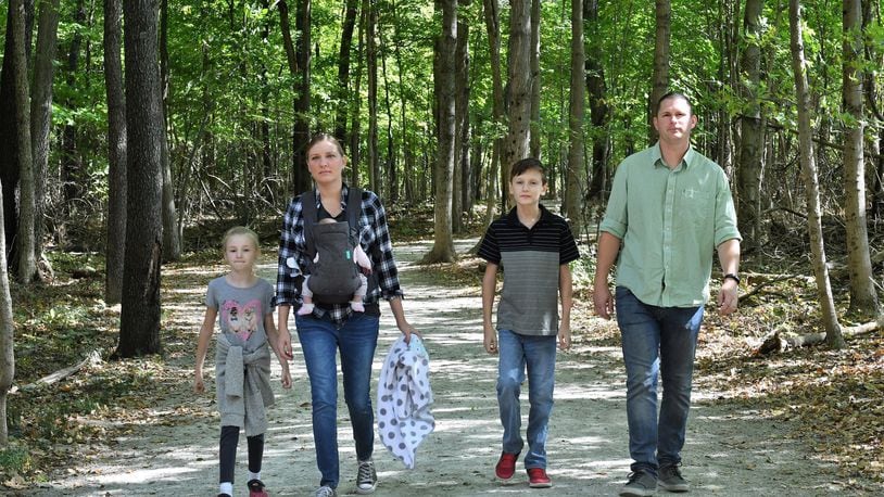 The Lyman family of Bethel Twp., Miami County, enjoys the offerings of Charleston Falls Preserve, one of the parks in the Miami County Park District System. CONTRIBUTED