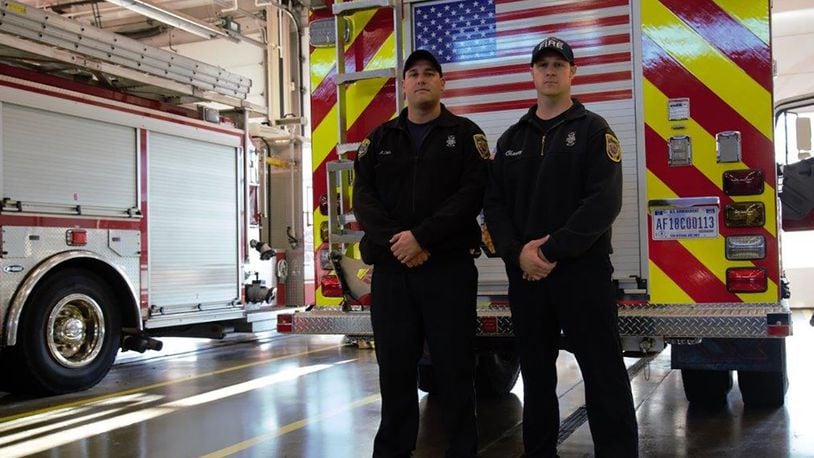 Firefighters Andrew Ohls (left), and Aron Chaney on duty at Fire Station 1. (U.S. Air Force photo/John Van Winkle)