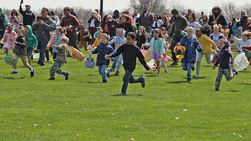 Hundreds of children participate in the annual Easter Egg Hunt at Young's Jersey Dairy north of Yellow Springs on Sunday, April 17, 2022. BILL LACKEY/STAFF