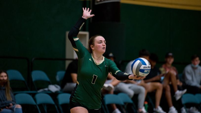 Wright State's Jenna Story prepares to serve in a match against IUPUI last season. Joseph Craven/Wright State Athletics