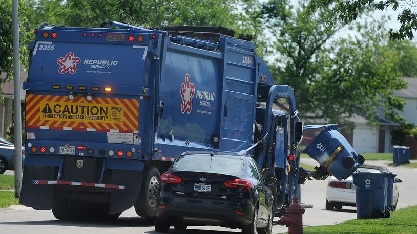Trash pick-up in Huber Heights Thursday, June 24, 2021, by Republic Services. MARSHALL GORBY\STAFF