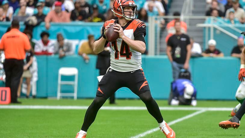 MIAMI, FLORIDA - DECEMBER 22: Andy Dalton #14 of the Cincinnati Bengals drops back to pass in the second half against the Miami Dolphins at Hard Rock Stadium on December 22, 2019 in Miami, Florida. (Photo by Eric Espada/Getty Images)
