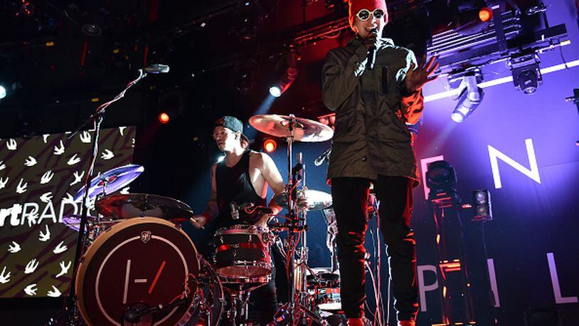 BURBANK, CA - MAY 19:  Musicians Josh Dun (L) and Tyler Joseph of Twenty One Pilots perform onstage during the iHeartRadio Live Series with Twenty One Pilots at the iHeartRadio Theater LA on May 19, 2015 in Burbank, California.  (Photo by Kevin Winter/Getty Images for iHeartMedia)