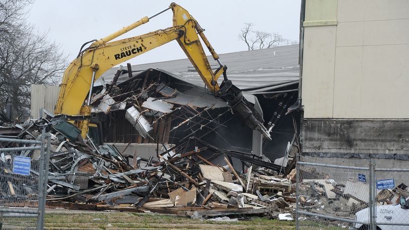 The abandoned Moraine Inn Suites & Conference Center at 2455 Dryden Road is demolished Monday, Dec. 21, 2020. The site, which has been vacant for years, is in the process of being redeveloped. MARSHALL GORBY\STAFF
