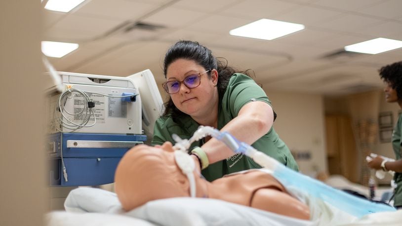 Heather Allyn, a Kettering College Respiratory Care student, works to simulate intubating a patient in a recent lab. CONTRIBUTED