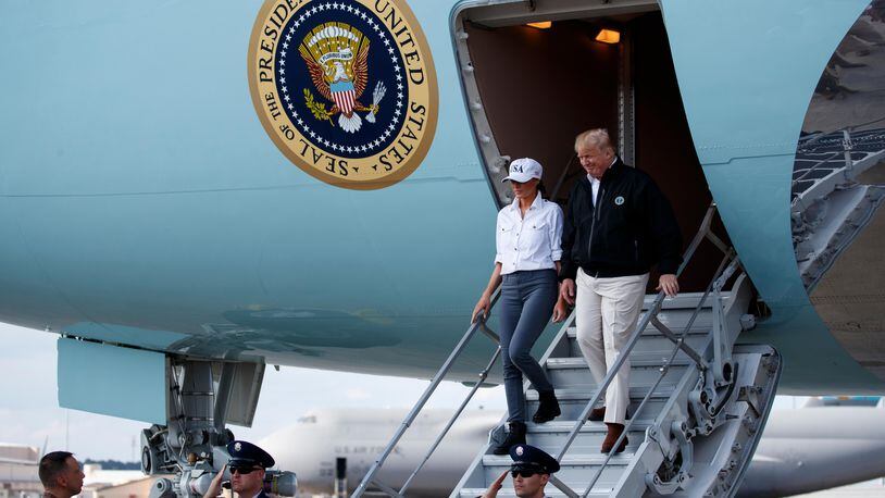 President Donald Trump and first lady Melania Trump arrive at Robins Air Force Base to visit areas affected by Hurricane Michael, Monday, Oct. 15, 2018, Robins Air Force Base, Ga.