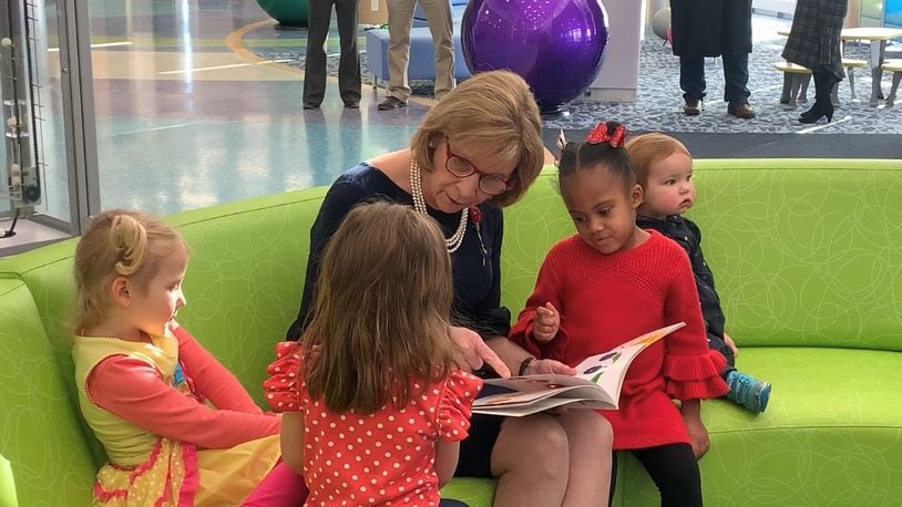 Ohio first lady Fran DeWine reads to children during a Dec. 18, 2019, visit to Dayton Children’s Hospital. SARAH CAVENDER/STAFF