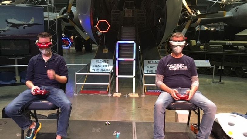 Pilots of micro-drones warm up for Saturday's drone racing event at the National Museum of the U.S. Air Force. THOMAS GNAU/STAFF