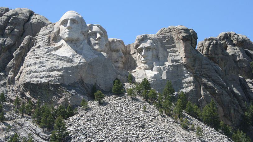 Mount Rushmore National Memorial in South Dakota’s Black Hills, the brainchild of sculptor Gutzon Borglum and a work of enormous proportions, was built over 14 years by 400 workers. (Mary Ann Anderson/TNS)