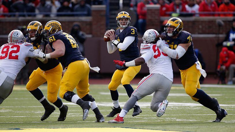ANN ARBOR, MI - NOVEMBER 28: Quarterback Wilton Speight #3 of the Michigan Wolverines looks to pass against the Ohio State Buckeyes in the fourth quarter at Michigan Stadium on November 28, 2015 in Ann Arbor, Michigan. (Photo by Gregory Shamus/Getty Images)