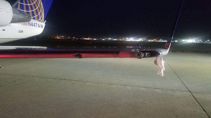 The wing of Air Wisconsin Flight 3818 on Wednesday night after the plane veered off the runway at the Dayton International Airport. CONTRIBUTED