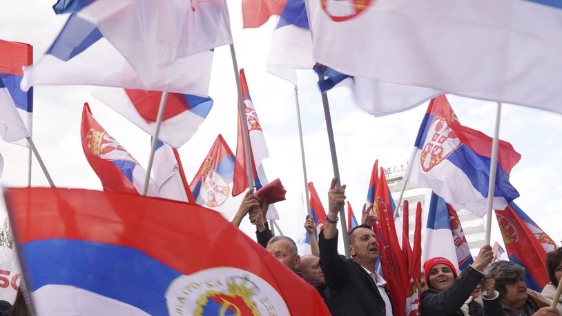 Supporters of Bosnian Serb political leader Milorad Dodik wave Serbian flags during protest against what he claims is Western aggression against Republika Srpska entity in the Bosnian town of Banja Luka, 240 kms northwest of Sarajevo, Thursday, April 18, 2024. (AP Photo/Radivoje Pavicic)