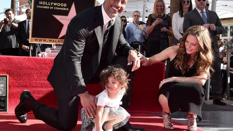 Actor Dwayne  "The Rock" Johnson, his daughter Jasmine and singer Lauren Hashian attend a ceremony when the actor received a star on the Hollywood Walk of Fame.