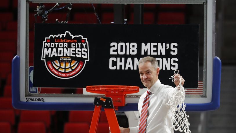 Wright State head coach Scott Nagy celebrates their 74-57 win against Cleveland State after an NCAA basketball game in the Horizon League tournament championship in Detroit, Tuesday, March 6, 2018. (AP Photo/Paul Sancya)
