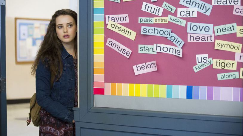 This image released by Netflix shows Katherine Langford in a scene from the series, “13 Reasons Why, ” about a teenager who commits suicide. The stomach-turning suicide scene has triggered criticism from some mental health advocates that it romanticizes suicide and even promoted many schools across the country to send warning letters to parents and guardians. The show’s creators are unapologetic, saying their frank depiction of teen life needs to be “unflinching and raw.” (Beth Dubber/Netflix via AP)