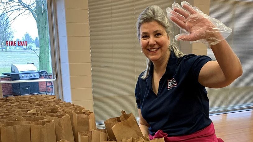 Gina Franz, operations specialist at the USO Center at Wright-Patterson Air Force Base, prepares coronavirus care packages March 19 to delivered to the 88th Medical Group. (Contributed photo)
