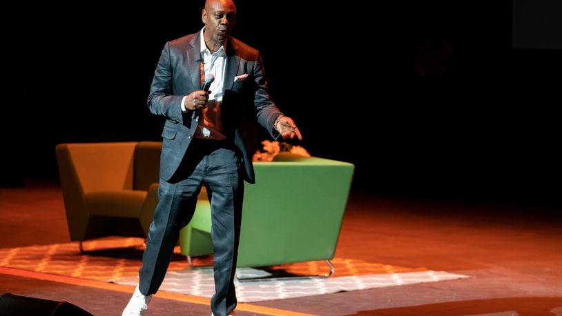 Dave Chappelle performs during a theater dedication ceremony honoring the comedian and actor, and to raise funds to support Duke Ellington School of the Arts in Washington, Monday, June 20, 2022. (AP Photo/Gemunu Amarasinghe)