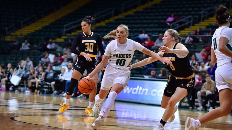 Wright State's Alexis Hutchison looks to drive around a Milwaukee player during Friday night's game at the Nutter Center. Joe Craven/WSU Athletics
