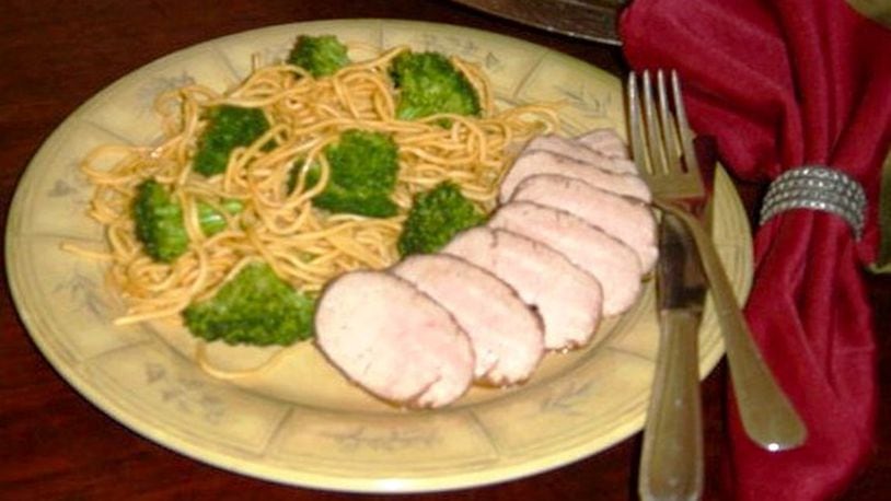 Asian-Flavored Pork Tenderloin with Stir-fried Broccoli and Noodles. (Linda Gassenheimer)