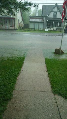 Streets flooding in Harveysburg.
