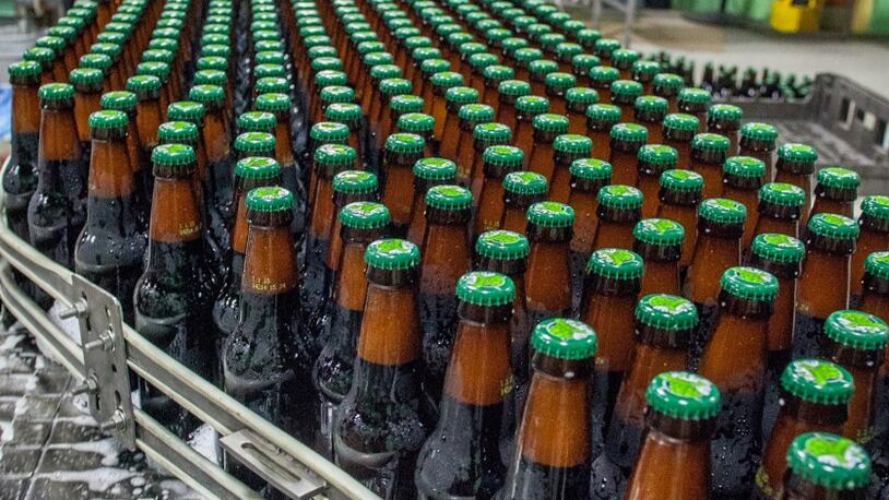 Bottles of beer move down a conveyor belt at Terrapin Beer Company.