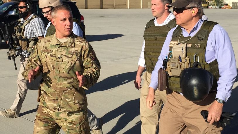 John Sopko, right, wearing the SIGAR hat, on the tarmac in Kabul, Afghanistan.  Contributed