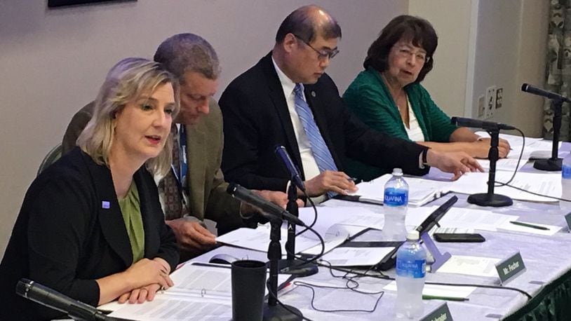 Wright State University president Cheryl Schrader, left, speaks during her first board of trustees meeting at the university. Schrader has been on the job for a little more than a month now.