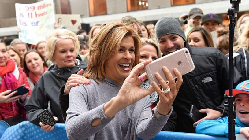 NEW YORK, NY - APRIL 29:  Hoda Kotb poses for a selfie with fans during NBC's "Today" at Rockefeller Plaza on April 29, 2016 in New York City.  (Photo by Matthew Eisman/Getty Images)