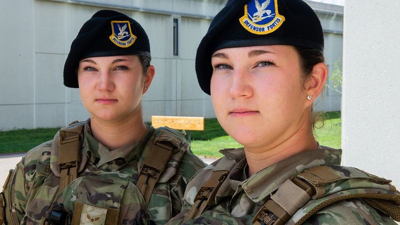 Airmen 1st Class Hailey and Hannah Browning are twin sisters assigned to the 88th Security Forces Squadron at Wright-Patterson Air Force Base. Originally from Aberdeen, South Dakota, the sisters joined the Air Force through the buddy system and will soon be moving to their second duty station together. U.S. AIR FORCE PHOTO/WESLEY FARNSWORTH