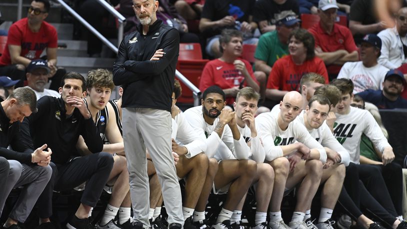 Wright State head coach Scott Nagy stands with his team at the bench during the second half of a first-round NCAA college basketball tournament game against Arizona, Friday, March 18, 2022, in San Diego. Arizona won 87-70. (AP Photo/Denis Poroy)
