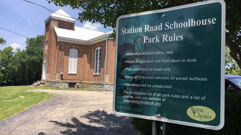 The historic Station Road schoolhouse is at the center of a legal battle between the owners of the Community Montessori School in West Chester Twp. who want to buy it from the township and neighbors who don’t want the sale.