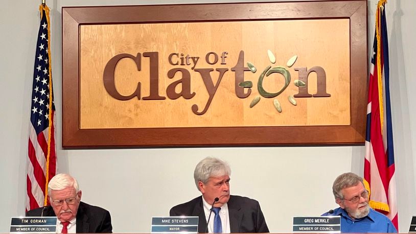 Clayton Mayor Mike Stevens, center, along with councilmen Tim Gorman, left, and Greg Merkle, listen to fellow council members during a discussion about the necessity of a new income tax during Thursday's meeting. AIMEE HANCOCK/STAFF