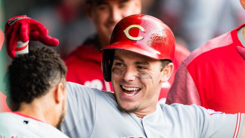 The Reds' Scooter Gennett celebrated after hitting a solo home run to tie the game during the fifth inning Monday against the Indians, but there weren't many smiles after that as Cincinnati fell 6-2.