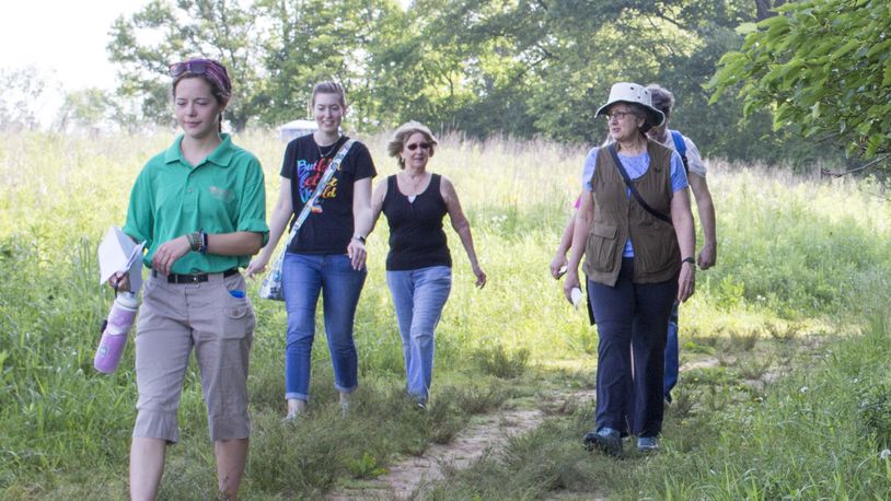The Winters-Bellbrook Community Library’s Walk and Talk Book Club discussed Bill Bryson s “A Walk in the Woods” while hiking through Sweet Arrow Reserve on June 17. CONTRIBUTED