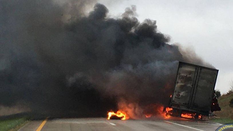 A truck carrying 42,000 pounds of raw chicken went up in flames early Friday.