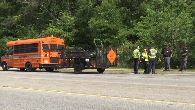 A Georgia prisoner was killed while on a work detail by a distracted driver, police said. Gwinnett County nvestigators were on the scene Wednesday morning following the deadly accident.
