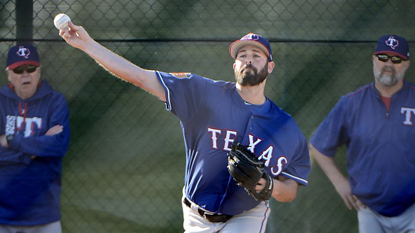 Texas Rangers relief pitcher Mike Hauschild (49) throws a bullpen session during practice at Rangers spring training on Monday, Feb. 20, 2017 in Surprise, Ariz. (Max Faulkner/Fort Worth Star-Telegram/TNS)